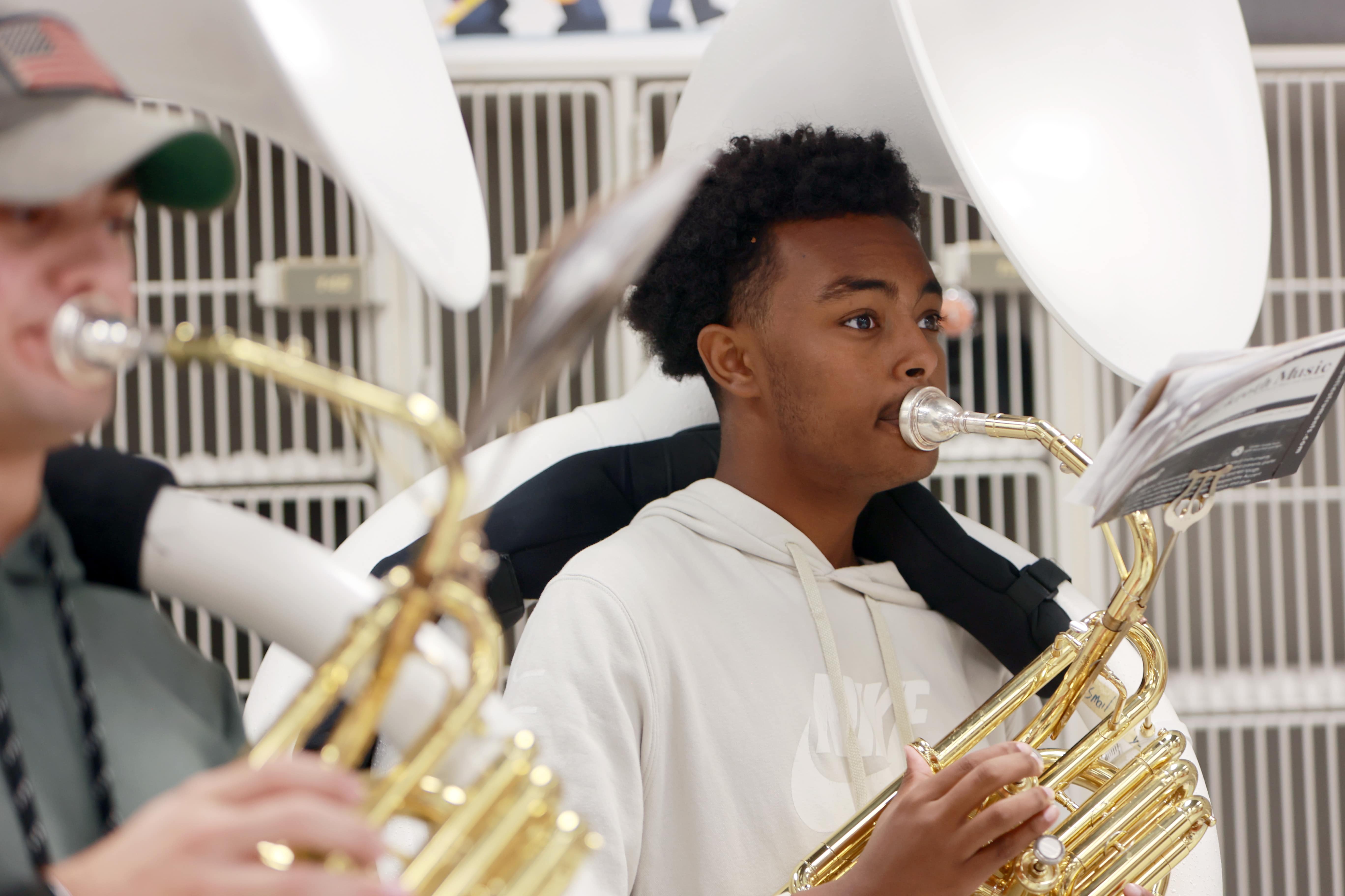 A Centennial student playing the tuba